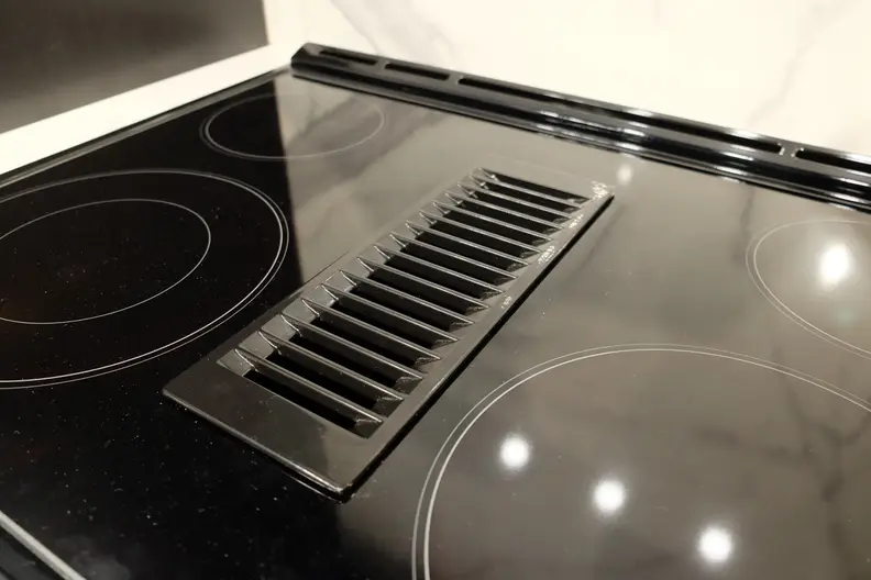 The new downdraft vent on an electric range
