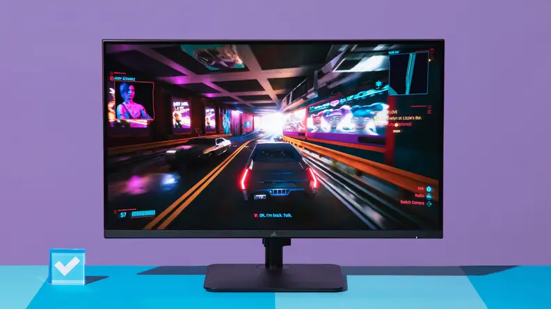 The monitor displaying Cyberpunk 2077.