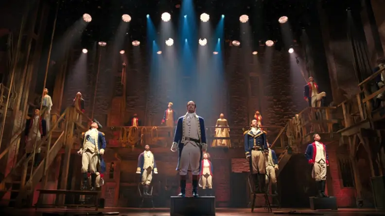 A still from Hamilton featuring most of the cast.