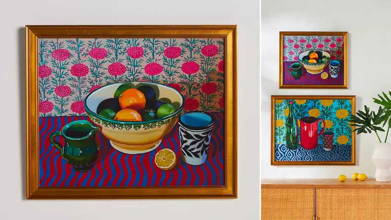 Close up of framed still life painting of fruit.