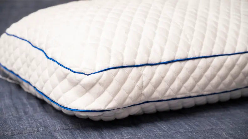 The corner of a pillow with a gusset