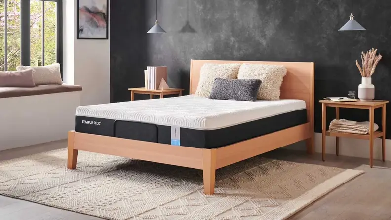 Tempur-Pedic Essential mattress in a bedroom setup.