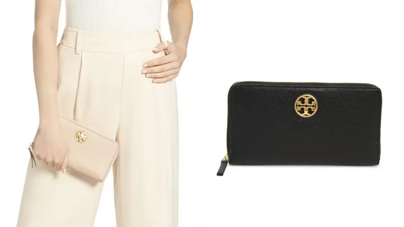 On left, woman wearing all white outfit while holding the cream Tory Burch Carson Zip Leather Continental Wallet. On right, product shot of the black Tory Burch Carson Zip Leather Continental Wallet.
