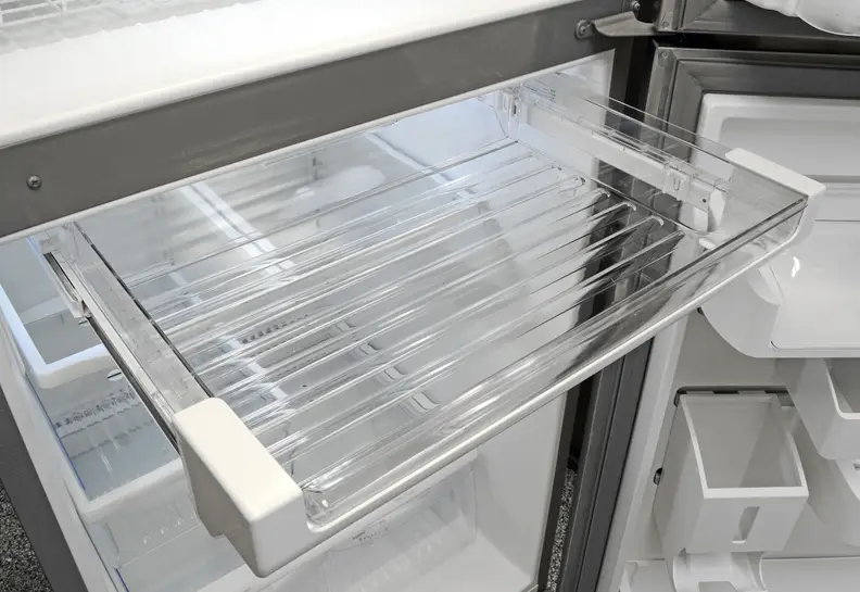 An extra drawer at the top of the Frigidaire Gallery FGHI2164QF's fridge compartment is ideal for storing easy-access snacks. You can even turn it into a drink rack.