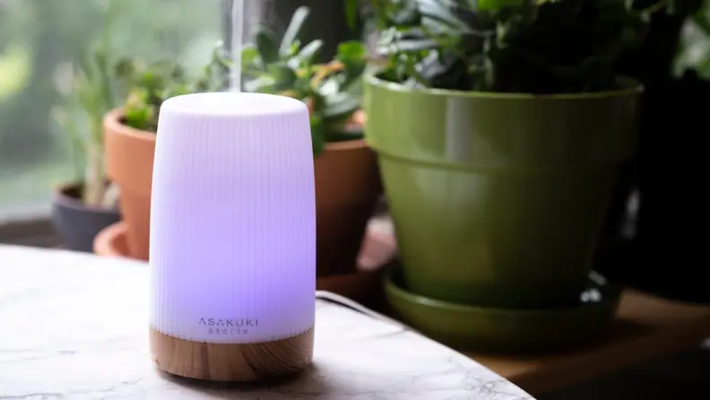 Close-up of the Airomé Serenity Diffuser on a table.