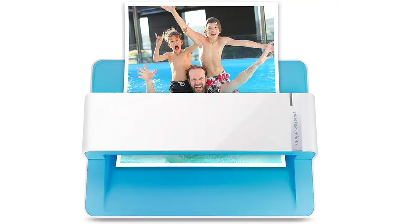 Photo scanner scanning a photo