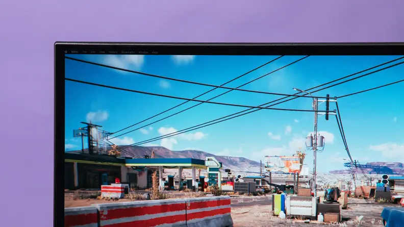 The monitor displaying Cyberpunk 2077.