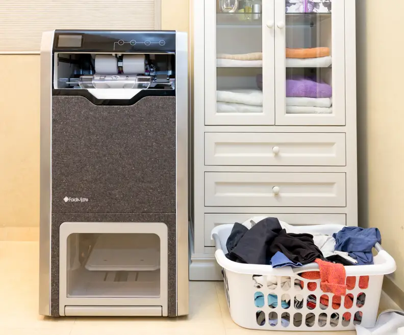 The Foldimate in a laundry room.