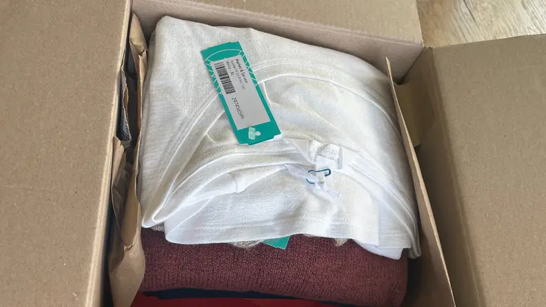 A box full of shirts by Stitch Fix.