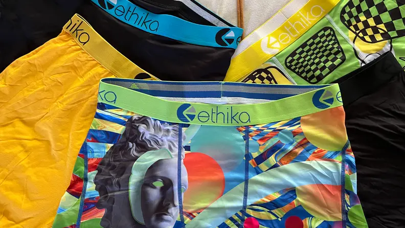 Five pairs of Ethika underwear laid on top of one another.