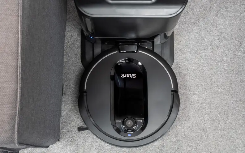 The Shark IQ self-empties into its charging dock.