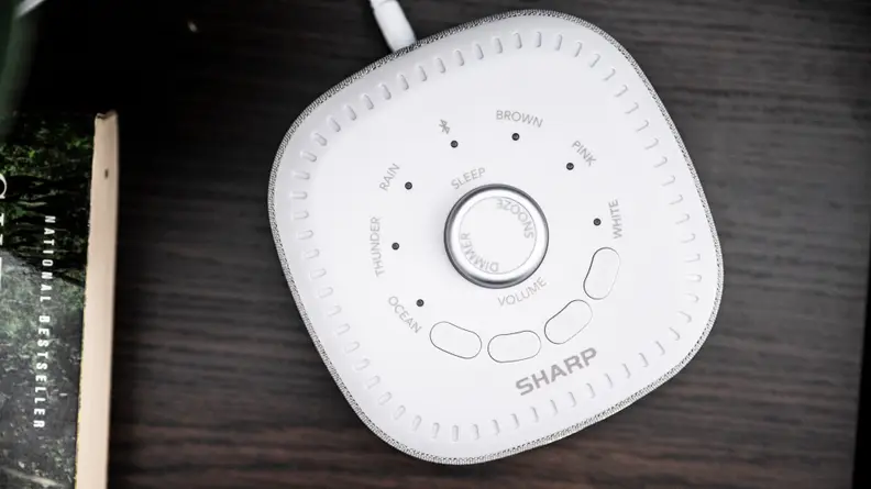 the top of the sharp alarm with a knob
