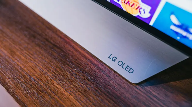 A close-up of the LG C1's stand and the LG insignia
