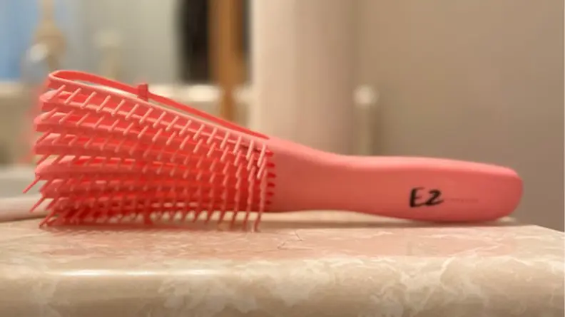 A photo of the EZ Detangler Brush.