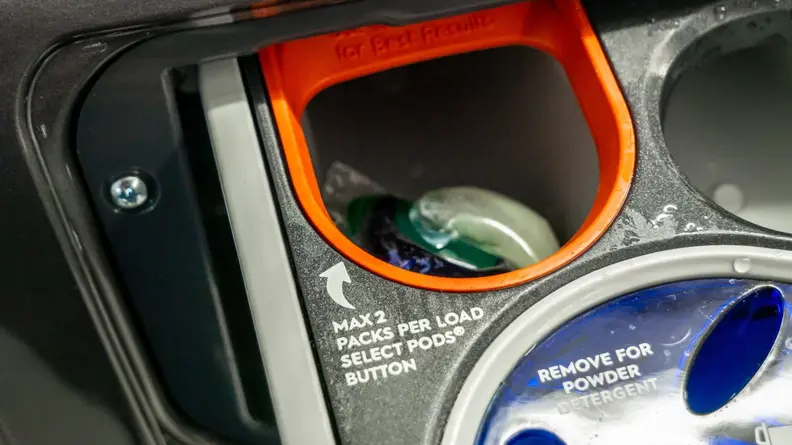 A Tide pod in the Electrolux ELFW7637AT’s dispenser.