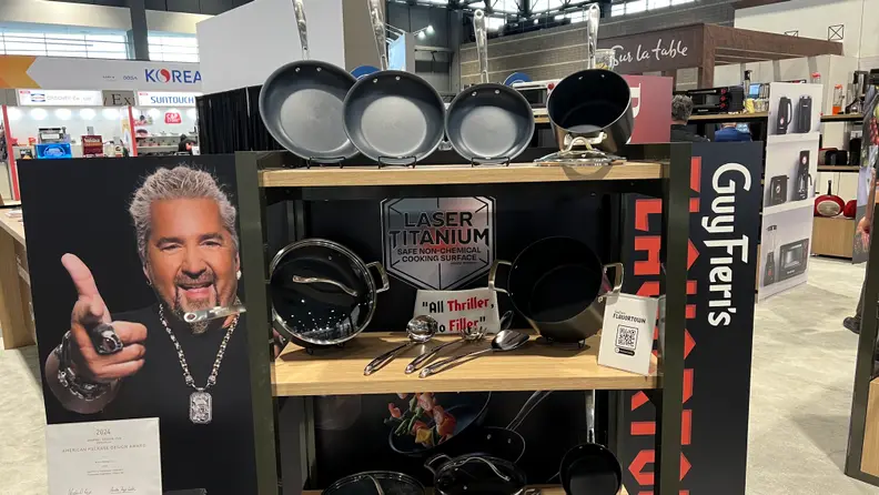 Display of Guy Fieri's Flavortown Cookware at the IHS Chicago Awards 2024.