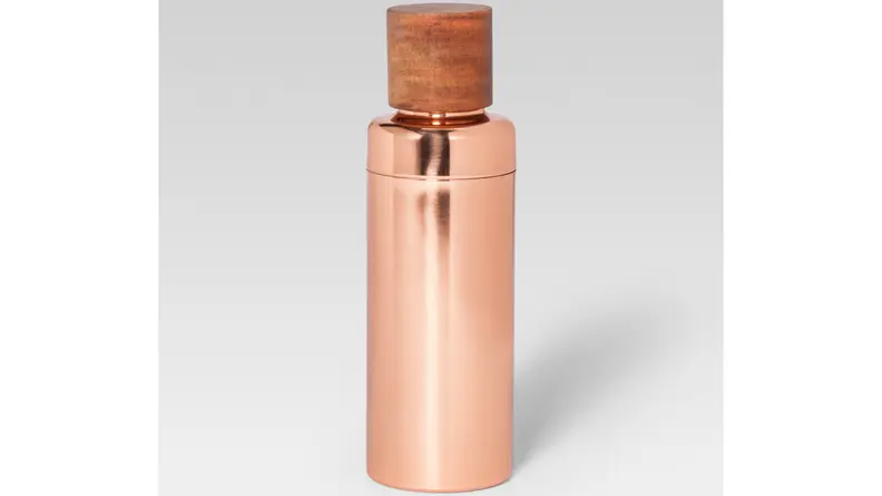 A rose gold cocktail shaker