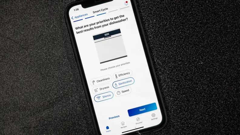 Phone on gray background with Bosch Home Connect app open