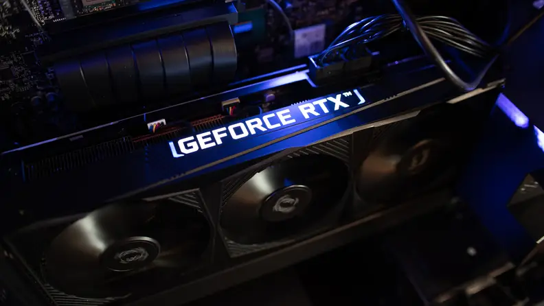 A rendering of a Nvidia graphics card with Geforce RTX emblazoned on the side in RGB lighting