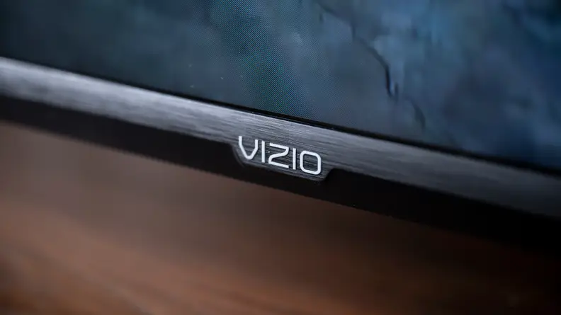 A close-up of the Vizio insignia found on the front of the 2021/2022 Vizio V-Series