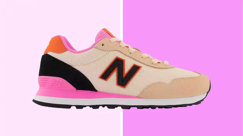 An image of a New Balance sneaker in tan, black, and hot pink.