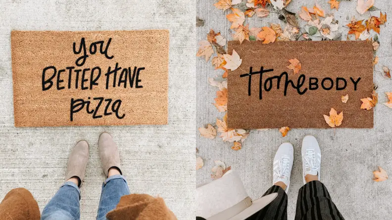 Doormats with text.