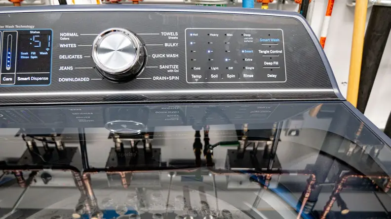 Product shot of the control panel on the GE Profile PTW900BPTRS washing machine.