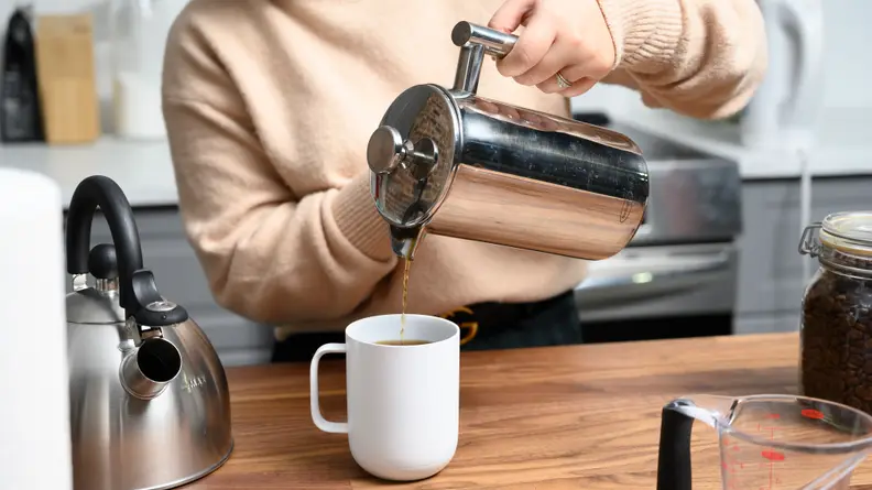 Serve the coffee with cream and sugar.