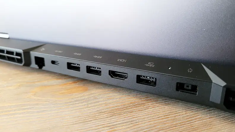 Close-up of ports on the back of a laptop.