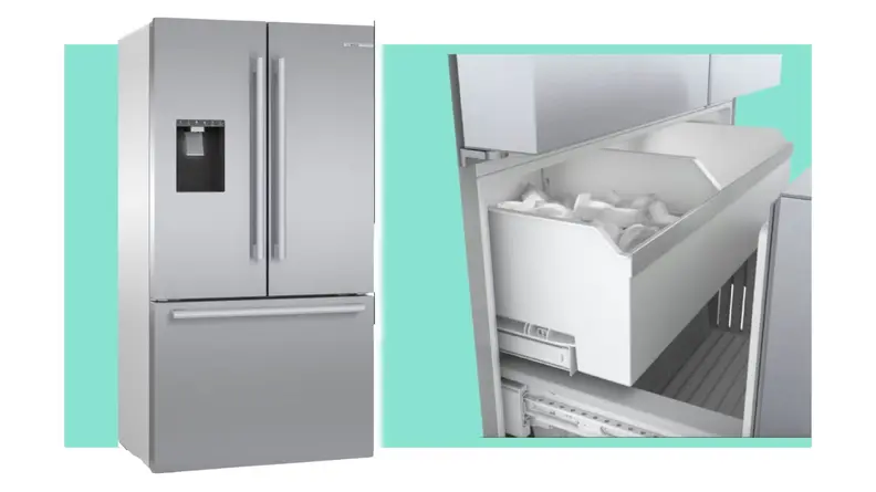 French double-door refrigerator from Bosch in stainless steel finish with ice dispenser on left door and bottom freezer drawer next to ice drawer inside of freezer pulled out.