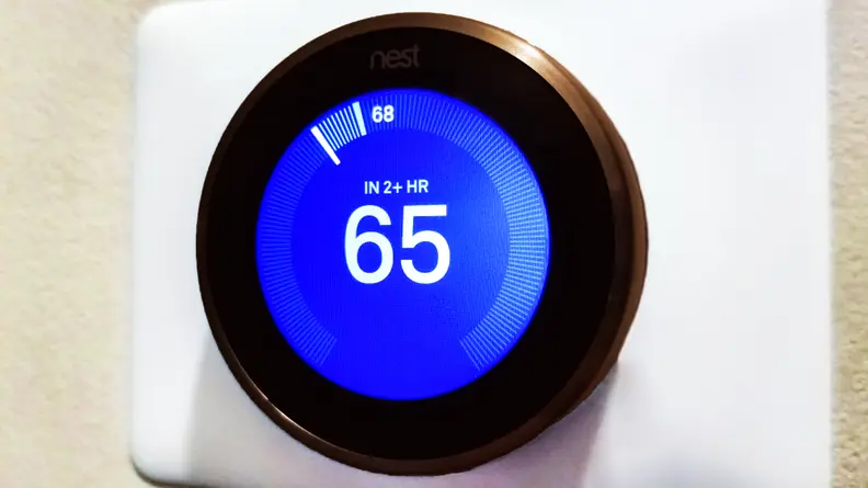Nest Learning Thermostat with blue cooling screen