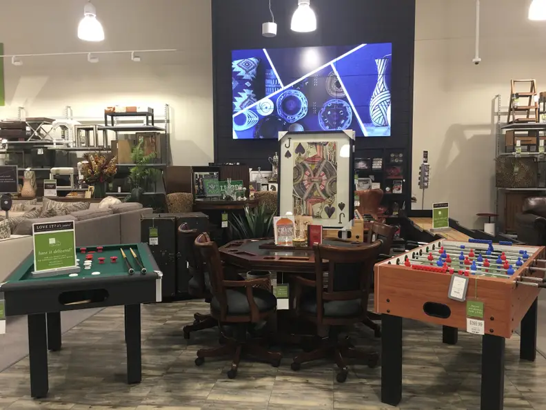 Pool table and poker table for a man cave at Homesense