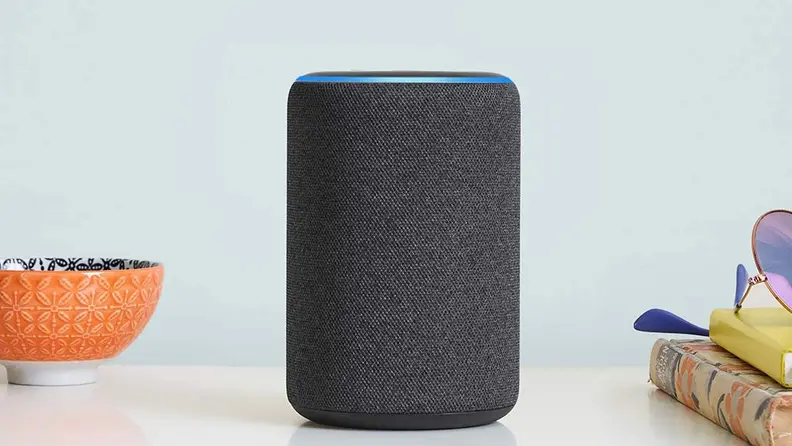 Amazon Echo 3 Alexa smart speaker with blue light ring illuminated