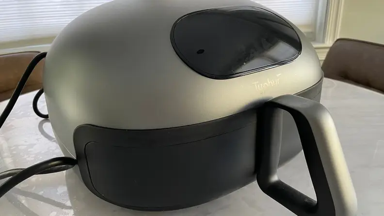 A close up of the Typhur Dome Air Fryer.