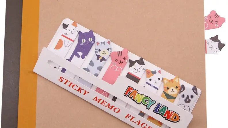 These sticky notes feature little kitty heads that pop out between pages.