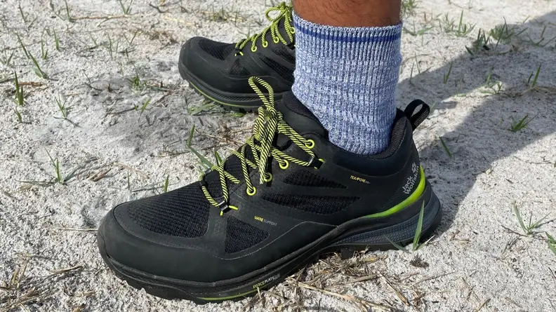 man in blue socks wearing Jack Wolfskin Force Striker shoe