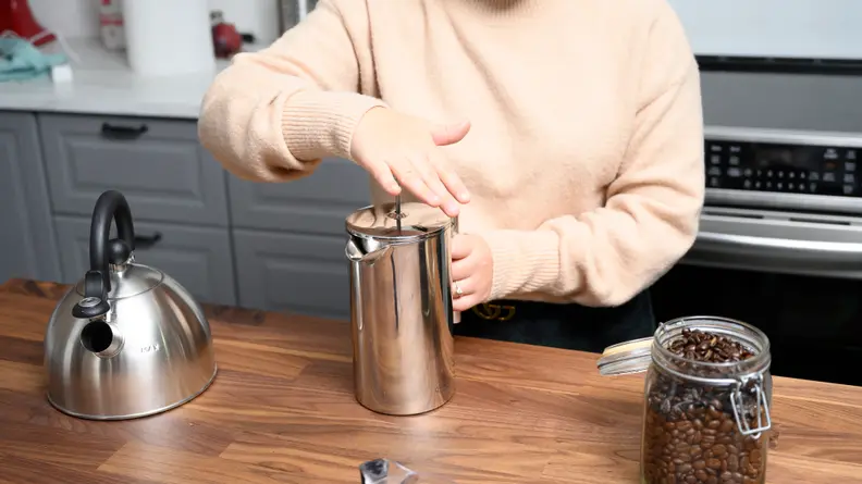 Press down the plunger when brewing is done.