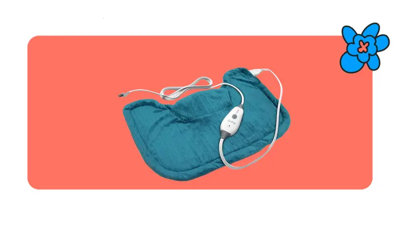 A cushioned Pure Enrichment massager with temperature control meter in front of a red background with a blue cartoon flower in the corner.