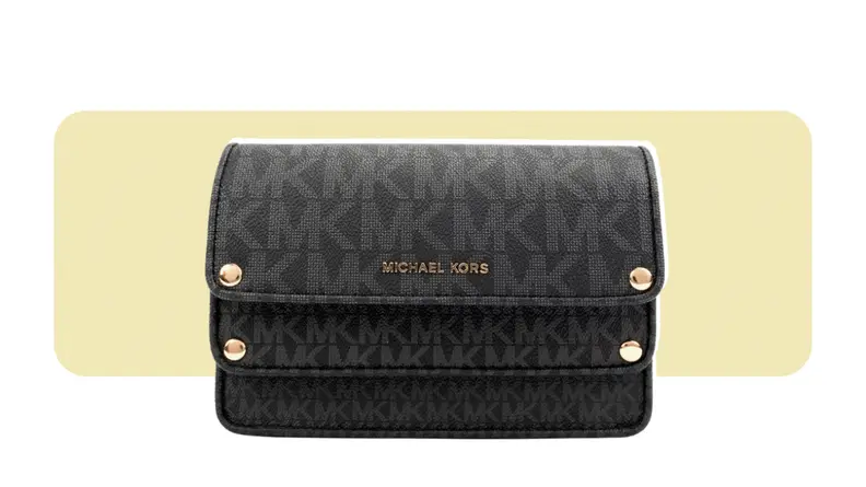 A belt-bag style wallet that is made up of faux leather printed with the Michael Kors initials logo.
