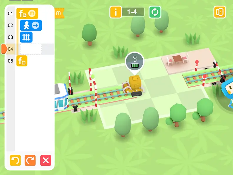 In the Tangiplay app, kids have to use coding commands to help the explorer robot bridge the gap and complete the railroad tracks.