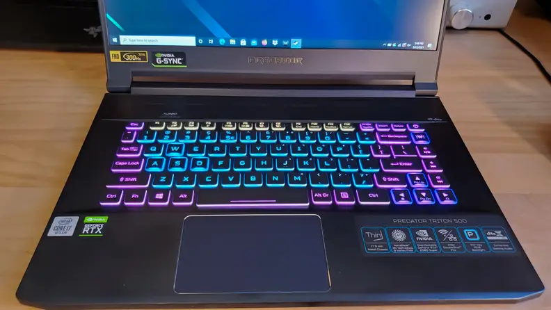 A shot of the lit-up keyboard with purple, pink, blue, and yellow keys
