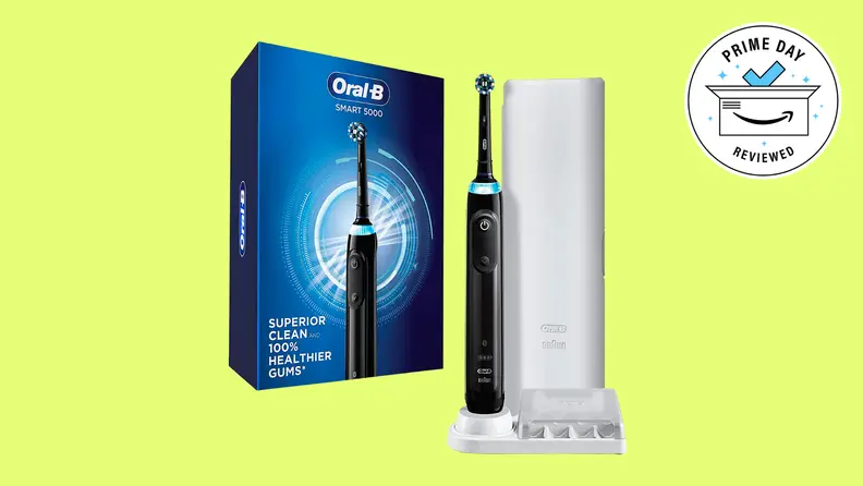 Oral B toothbrush on yellow background