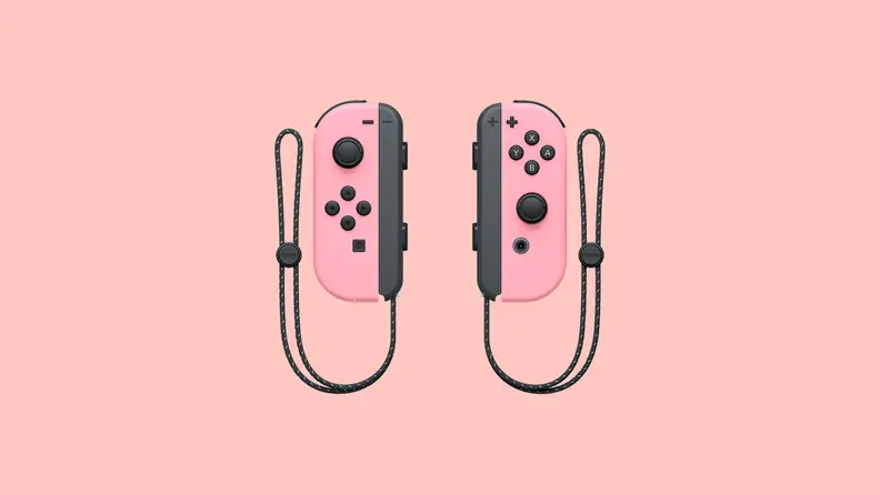 pink joy cons on pink background