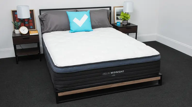 The Helix Midnight Luxe mattress in a bedroom.