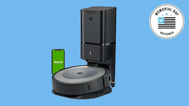 An iRobot vacuum against a blue background.