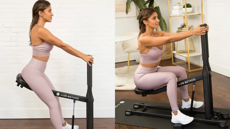 Woman using DB method squat machine.