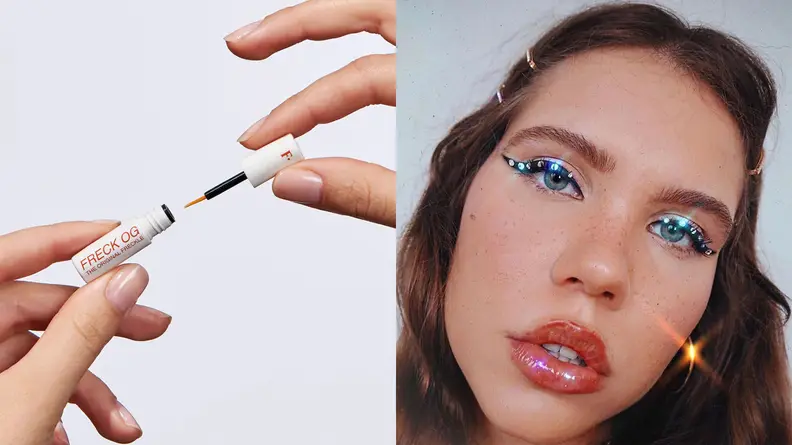 On the left: On a grey background, two hands hold either end of an open Freck Beauty OG Freckle Pen. On the right: A young person stares at the camera. They're wearing shiny lip gloss and thick, black eyeliner on their eyes with rhinestones positioned over the liner.