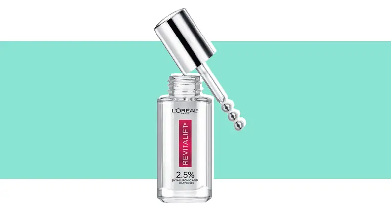 Under-eye serum against a green background.