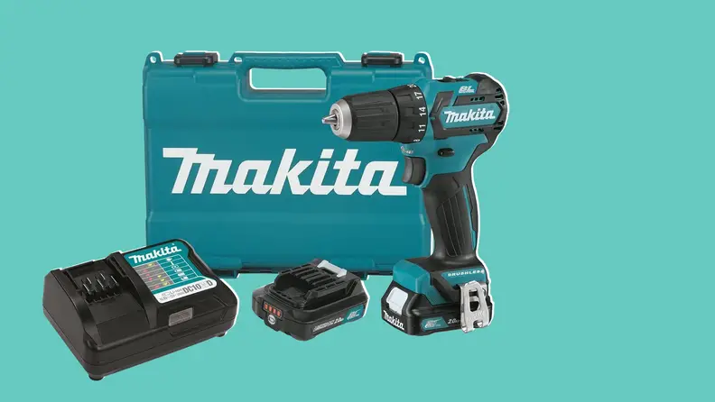 Makita cordless drill kit on blue background