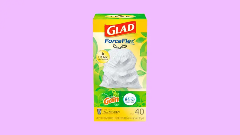 A green and yellow box of Glad ForceFlex Plus trash bags on a purple background.